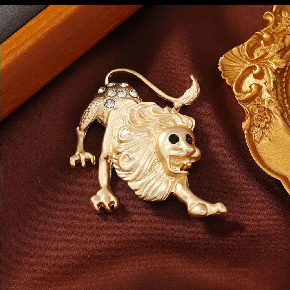 ZODIAC BROOCHES‎